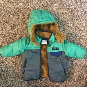 Baby boys Patagonia fleece lined down jacket. Age 3-6 months.